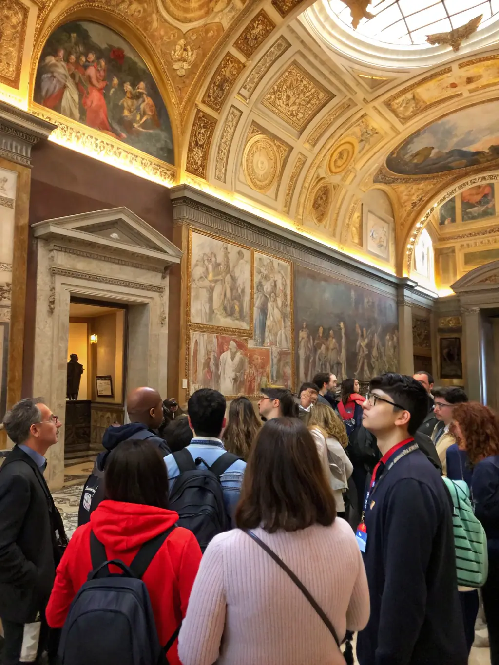 A vibrant image of children and adults participating in a guided tour inside the Saint-Théodore church, engaging with historical exhibits and learning about its rich cultural significance.